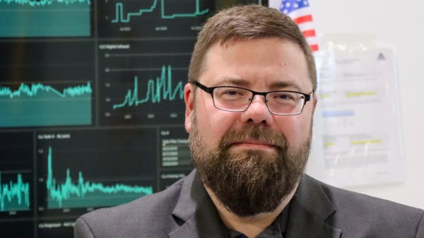 T Rivers headshot office bkgd