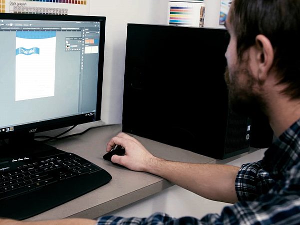 Billy Working on Illustrator Image from General Marketing Video