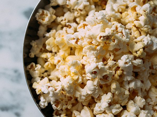Popcorn in a Bowl Sitting on a Table