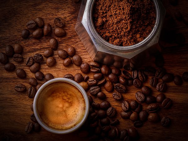 Coffee Beans and Ground Coffee on a Table